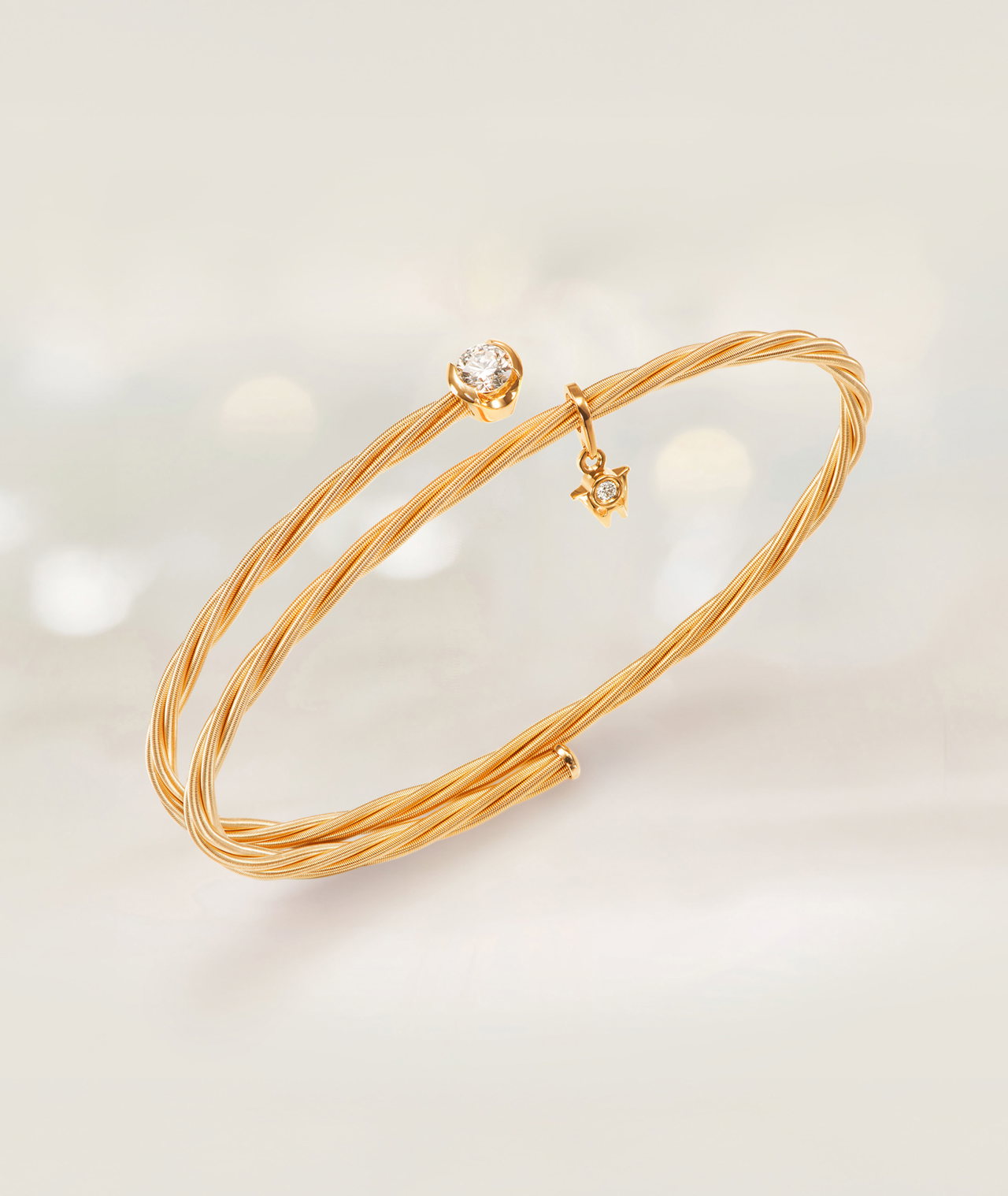 Goldenes Armband UMARME MICH Power of solitaire von Wellendorff