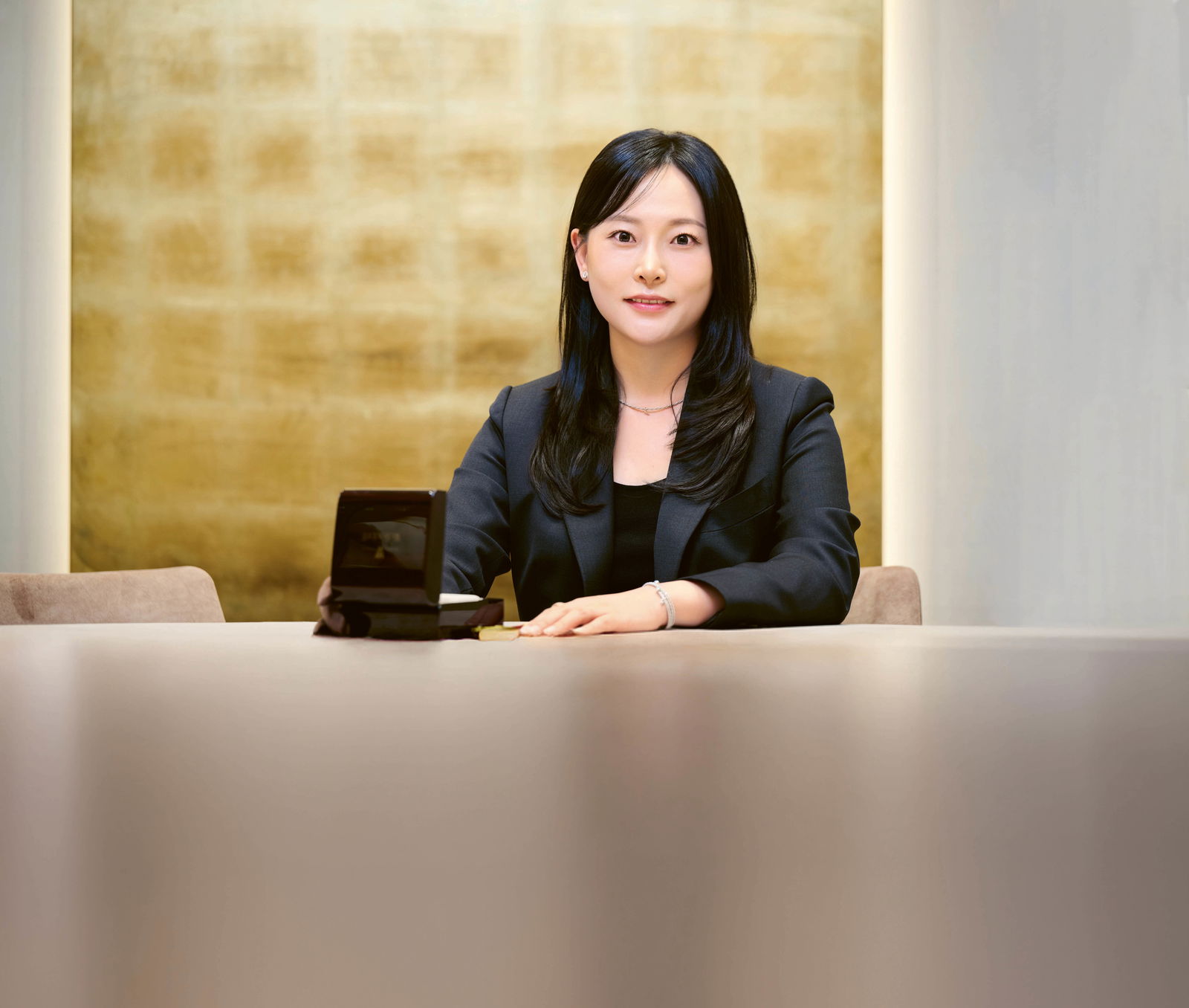 Portrait photograph of jewellery expert Eunji Lim, the manager of the Wellendorff boutique in Seoul