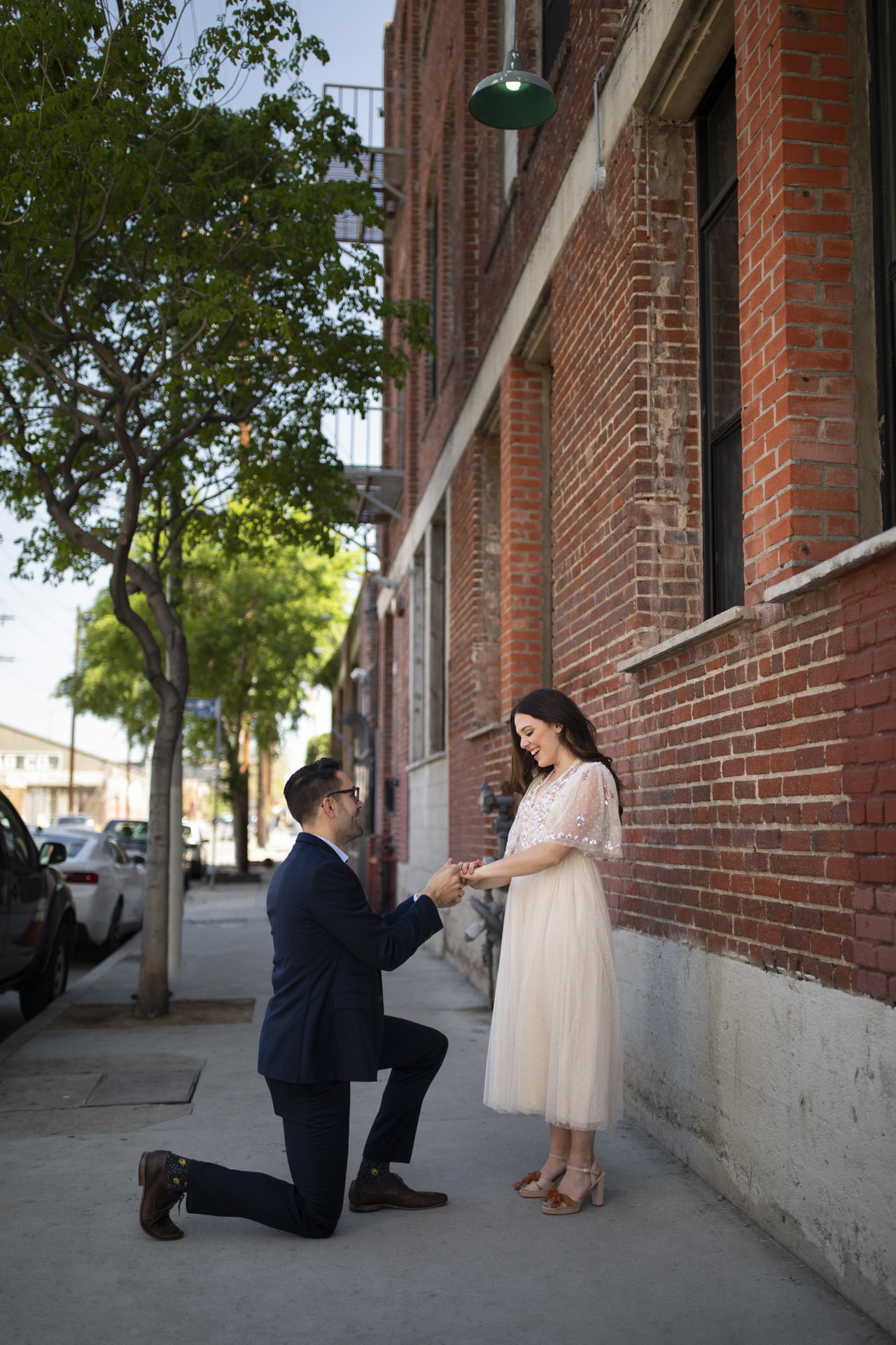 man-proposing-woman-outdoors-street
