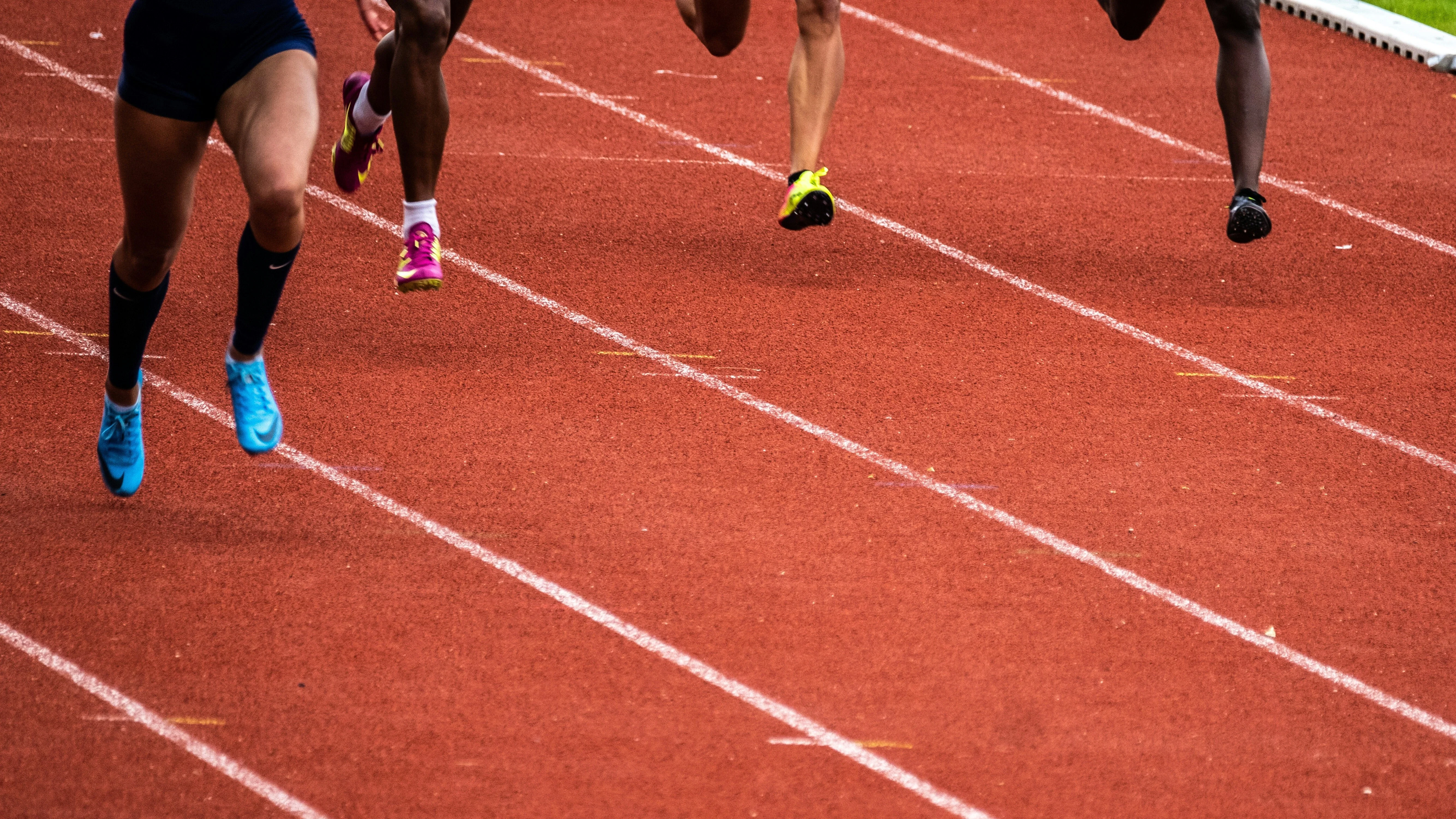Four runners on one track